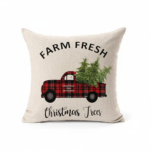 Decorative pillow with a red plaid truck and Christmas trees design, featuring the text 'Farm Fresh Christmas Trees'.