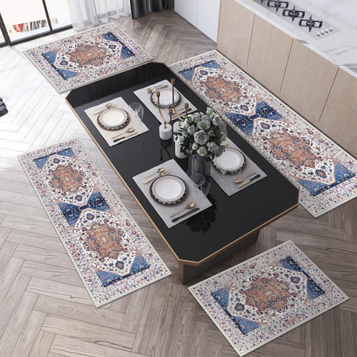 Decorative rugs with intricate patterns on a wooden floor